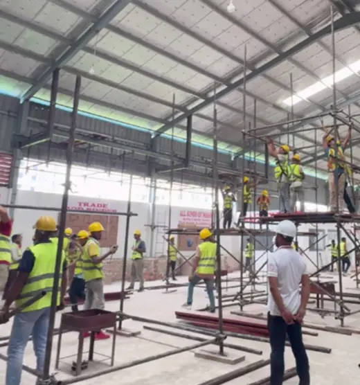 Scaffolder trainees on a frame